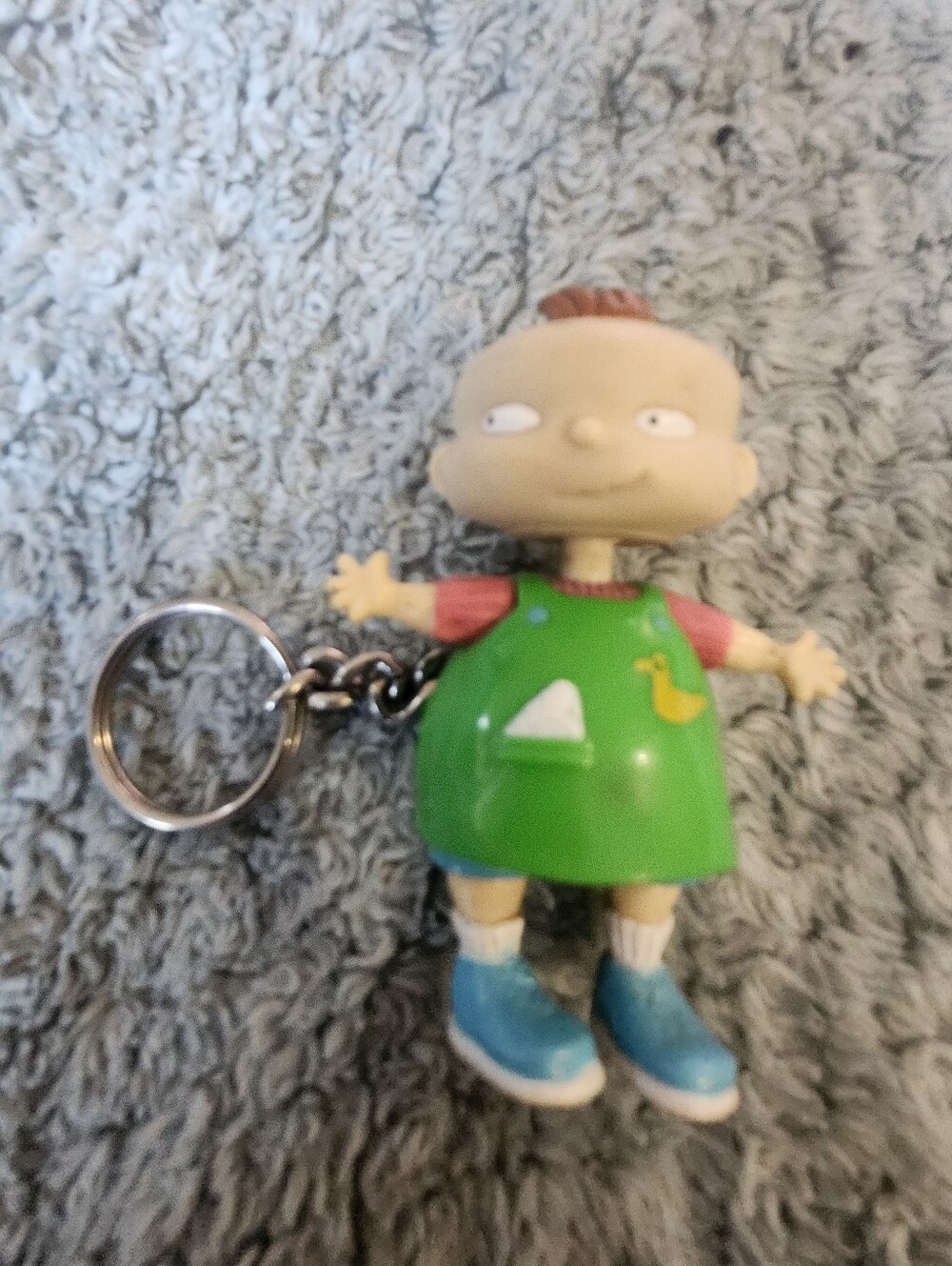 vintage 1997 Basic Fun Rugrats keychain featuring the character Lil DeVille.